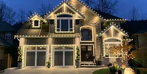 Beautiful home adorned with professional SoCal Christmas lighting, showcasing custom festive designs and holiday cheer.